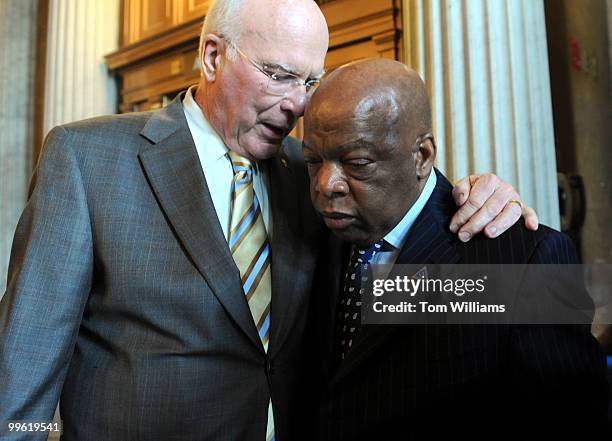 Rep. John Lewis, D-Ga., right, talks with Sen. Pat Leahy, D-Vt., after a meeting with democratic senators which Lewis discussed the history of the...