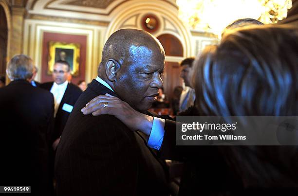 Rep. John Lewis, D-Ga., arrives at a premiere of "Come Walk In My Shoes," a documentary on the Congressman's involvement in the Civil Rights...