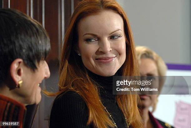Actress Marcia Cross, "Desperate Housewives," center, attends a news conference a with Rep. Rosa DeLauro, D-Conn., left, and Sen. Mary Landrieu,...