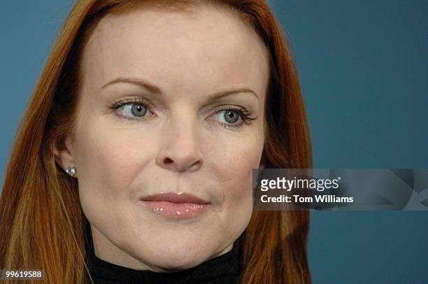 Actress Marcia Cross, "Desperate Housewives," attends a news conference a with Rep. Rosa DeLauro, D-Conn., left, and Sen. Mary Landrieu, D-La., to...