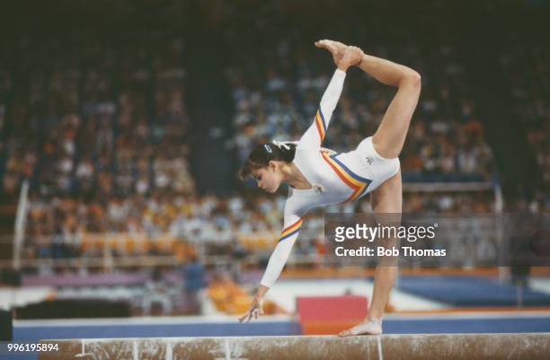 Simona Pauca of Romania competes in the women's balance beam competition of the artistic gymnastics events at the 1984 Summer Olympics in Los Angeles...
