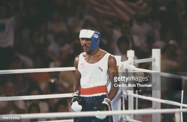 American boxer Evander Holyfield pictured in action for the United States against Ismail Salman of Iraq in the second round of the Men's light...