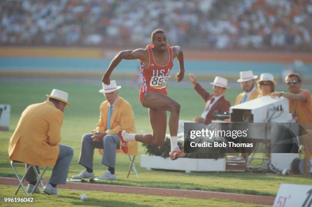 American athlete Mike Conley of the United States team pictured competing to finish in second place to win the silver medal in the Men's triple jump...