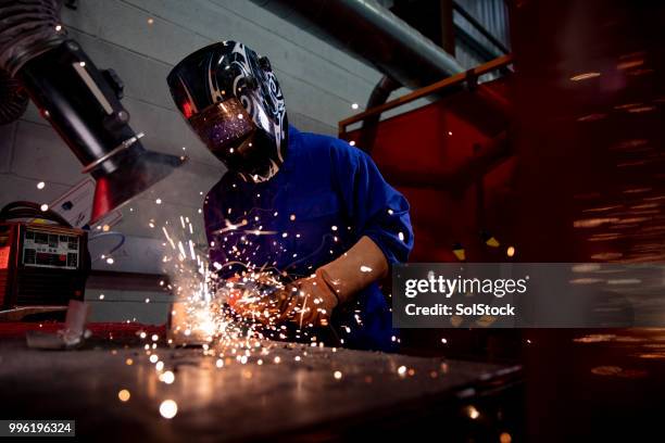 welding in the engineering workshop - welding stock pictures, royalty-free photos & images