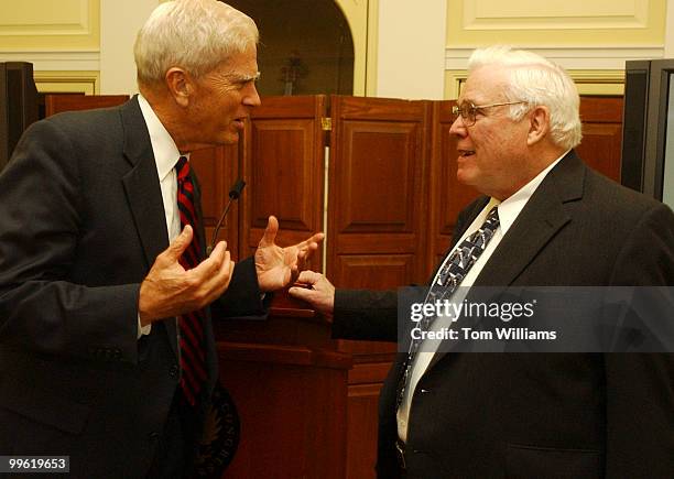 Librarian of Congress James H. Billington, left, talks to J. Arthur Wood Jr., at a press opening for Library's aquisition of Wood's collection of...