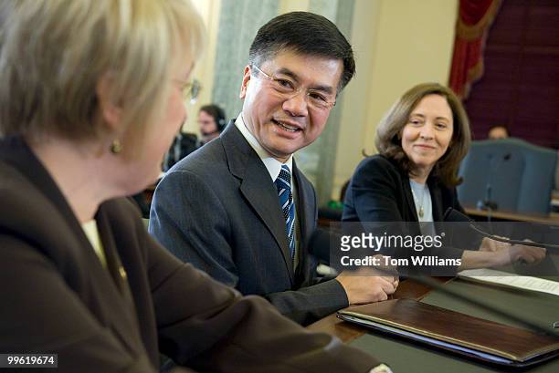 Nominee for Commerce secretary former Gov. Gary Locke, D-Wash., talks with Sens. Patty Murray, D-Wash., left, and Maria Cantwell, D-Wash., before...