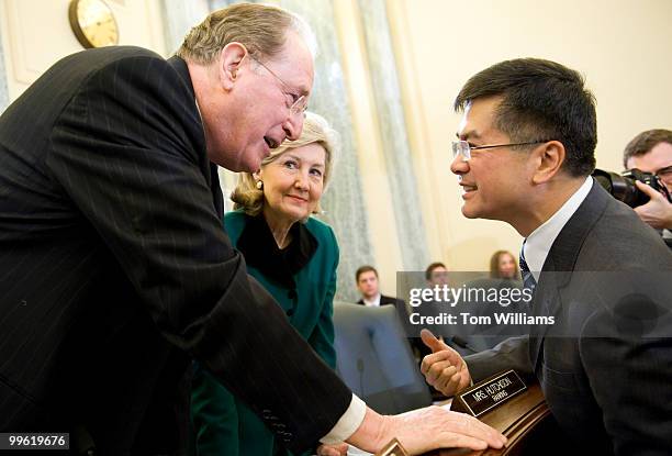 Nominee for Commerce secretary former Gov. Gary Locke, D-Wash., talks with Chairman John Rockefeller, D-W.V., and ranking member Kay Bailey...