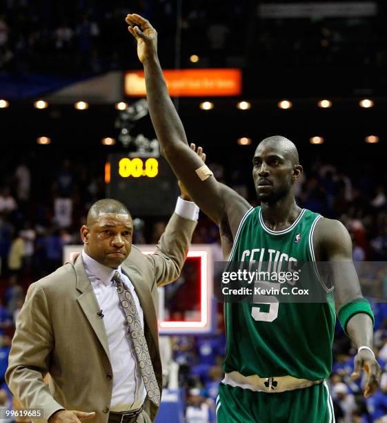 Head coach Doc Rivers and Kevin Garnett of the Boston Celtics celebrate after the Celtics won 92-88 against the Orlando Magic in Game One of the...