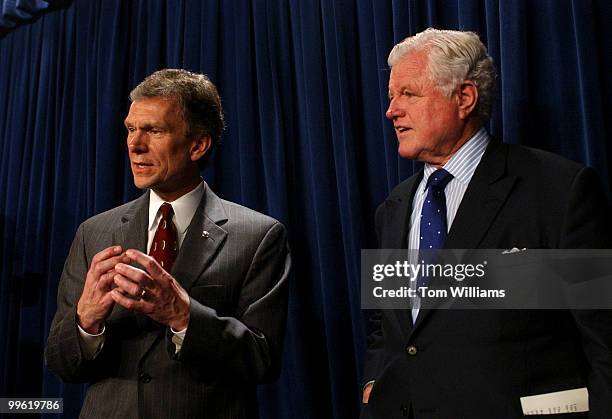 Sens. Tom Daschle, D-S.D., and Ted Kennedy, D-Mass., talk after a news conference reacting to the passage of the Medicare Bill.