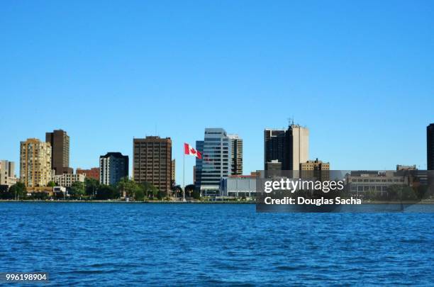 downtown city skyline on the river - windsor canada stock pictures, royalty-free photos & images