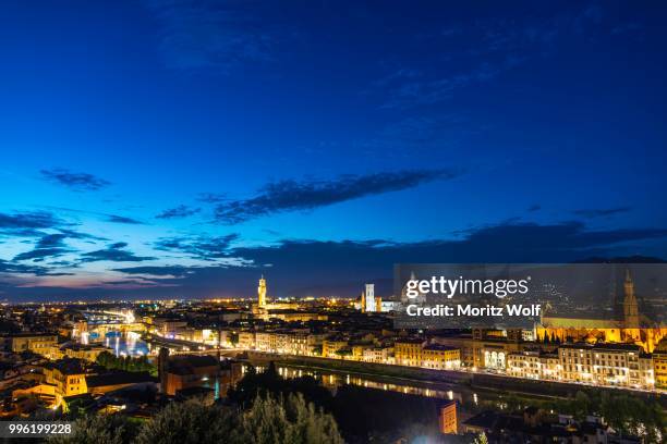 illuminated city panorama at dusk with florence cathedral, duomo santa maria del fiore with the dome by brunelleschi, palazzo vecchio, ponte vecchio, unesco world heritage site, florence, tuscany, italy - fiore stock pictures, royalty-free photos & images