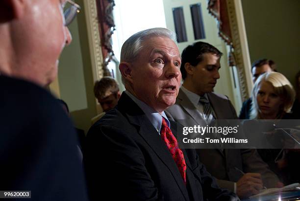 Sen. Jeff Sessions, R-Ala., center, attends the media stakeout after the senate luncheons with Senate Minority Leader Mitch McConnell, R-Ky., Sen....