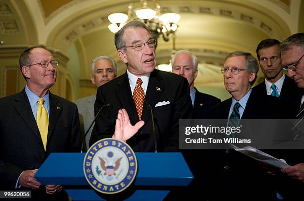 Sen. Charles Grassley, R-Iowa, addresses the media after the senate luncheons, March 17, 2009. Also appearing are, from left, Sens. Lamar Alexander,...