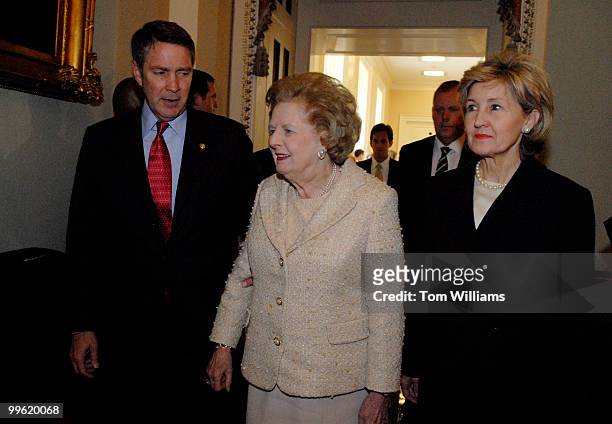 Former British Prime Minister Margaret Thatcher leaves the republican Senate Luncheon with Senate Majority Leader Bill Frist, R-Tenn., and Sen. Kay...