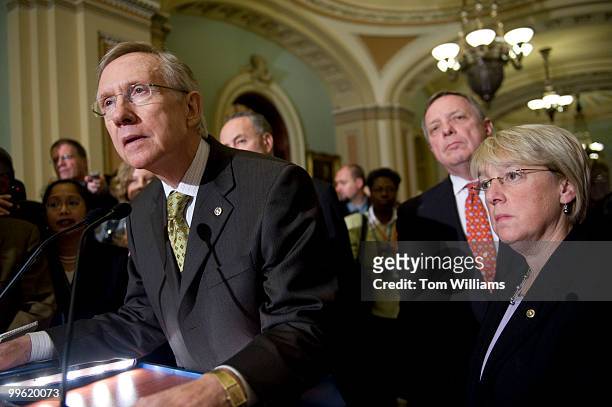 Senate Majority Leader Harry Reid, D-Nev., left, fields a question after the senate luncheons, Nov. 3, 2009. Sen. Charles Schumer, D-N.Y., Senate...
