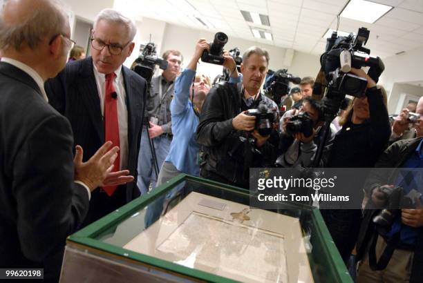 Allen Weinstein, far left, Archivist of the Capitol, talks with David Rubenstein, new owner of the 1297 Magna Carta during a news conference at the...