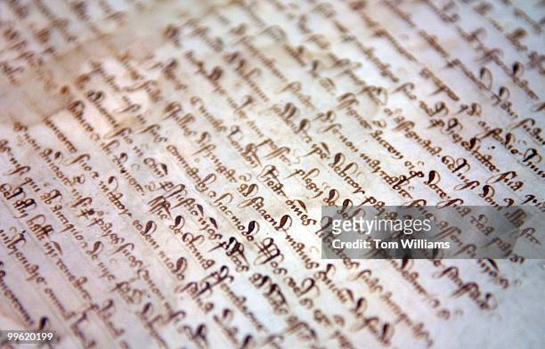 This picture depicts the writing on the 1297 Magna Carta at the National Archives during a news conference with it's new owner David Rubenstein....