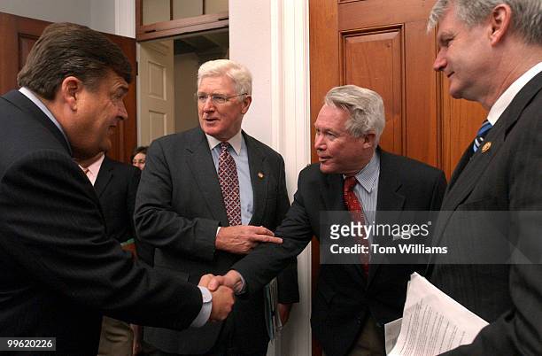 Rep. Dutch Ruppersberger, left, is introduced to Dr. N. Thomas Connally, by Rep. Jim Moran, D-Va., as Rep. Brian Baird, D-Wash., looks on, before a...