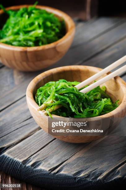 japanese chuka salad on the wooden table - chuka stock pictures, royalty-free photos & images