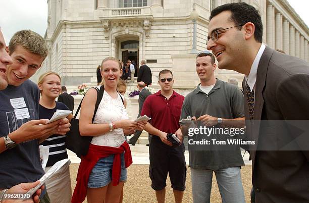 Will Markson, talks to interns from Pentagon in front of Russell Building, during his walking campaign for President.