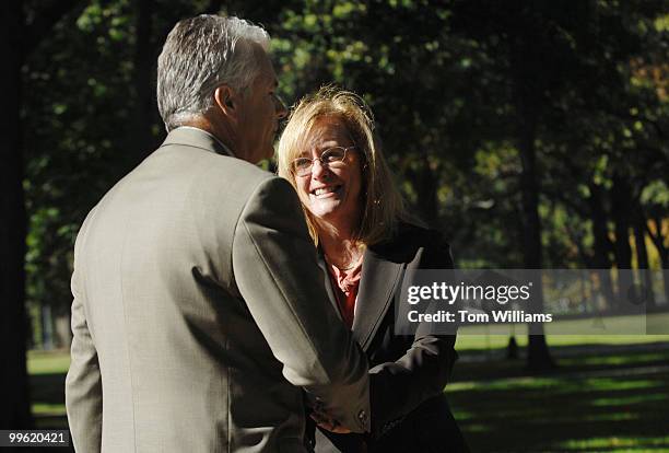 Susan Priestman of American Physical Therapy Association, greets Sen. John Ensign, R-Nev., before a news conference calling on Congress to enact...