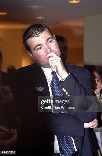 Dan McFaul, staff member of Florida Rep. Joe Scarborough, R-FL, watches returns come in on TV, at the RNC party at the Capital Hilton.