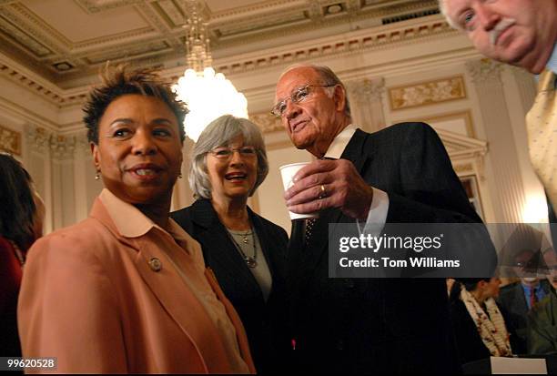 Former Senator George McGovern, talks with Reps. Barbara Lee, D-Calif., left, and Lynn Woolsey, D-Calif., before a forum to examine policy options...