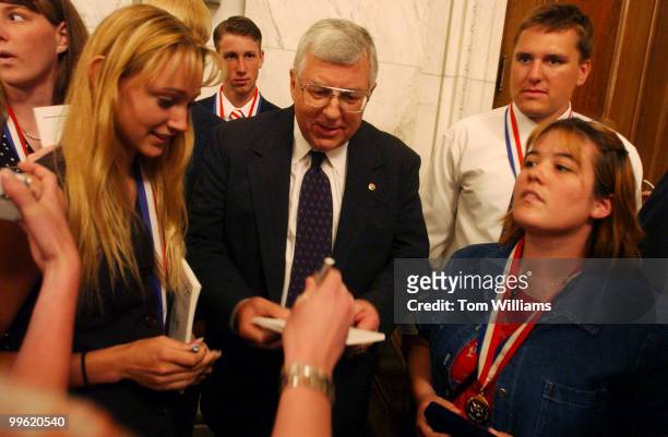 Sen. Mike Enzi, R-Wyo., signs autographs for winners of the Congressional Award Gold Medal, including Jacquelyn Bell, at left of Gillette, Wyoming,...