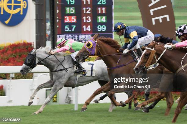 Jockey Gerald Mosse riding Winnam wins Race 8 Big Profit Handicap at Sha Tin racecourse during Season Finale race day on July 12 , 2015 in Hong Kong.