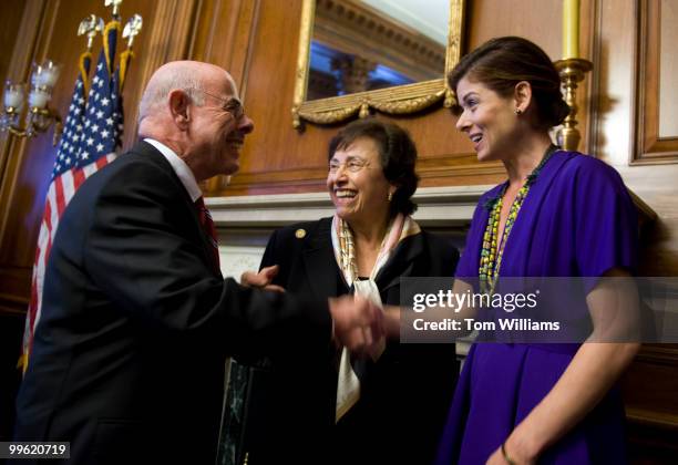 Actress and Population Services International ambassador Debra Messing, right, talks with Rep. Nita Lowey, D-N.Y., and Rep. Henry Waxman, D-Calif.,...