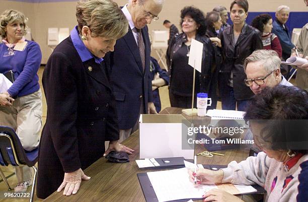 Rep. Connie Morella, R-MD, alongside husband Tony,wait for their ballots in the voting center at the Walt Whitman High School in Bethesda, MD on the...