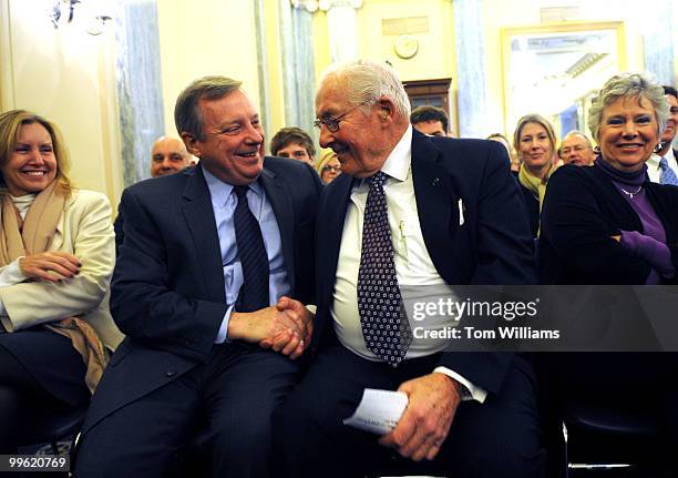 Former House Minority Leader Bob Michel, right, greets Senate Minority Whip Richard Durbin, D-Ill., before the confirmation hearing of Ray LaHood for...