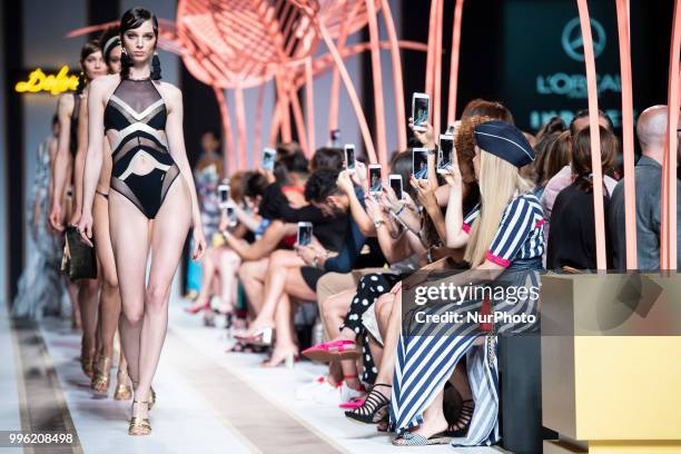 Model walks the runway at the 'Dolores Cortes' catwalk during the Mercedes-Benz Madrid Fashion Week Spring/Summer in Madrid, Spain. July 10, 2018.