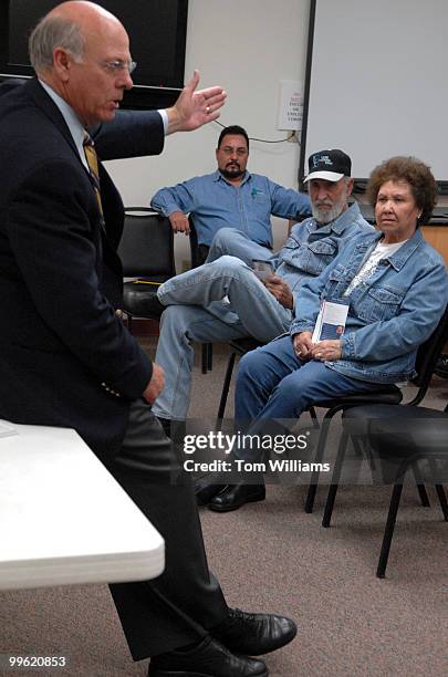 Ken Flores, center, alone with his parents Luis and Eloisa attend a meeting with Rep. Steve Pearce, R-N.M., at Luna Community College in Santa Rosa,...