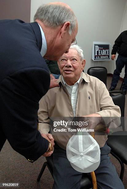 Rep. Steve Pearce, R-N.M., left, talks with Evy Gallegos after a meeting with local republicans at Luna Community College in Santa Rosa, N.M.