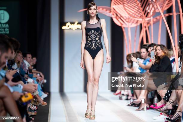 Model walks the runway at the 'Dolores Cortes' catwalk during the Mercedes-Benz Madrid Fashion Week Spring/Summer in Madrid, Spain. July 10, 2018.