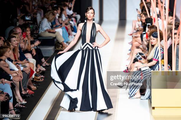 Model walks the runway at the 'Dolores Cortes' catwalk during the Mercedes-Benz Madrid Fashion Week Spring/Summer in Madrid, Spain. July 10, 2018.