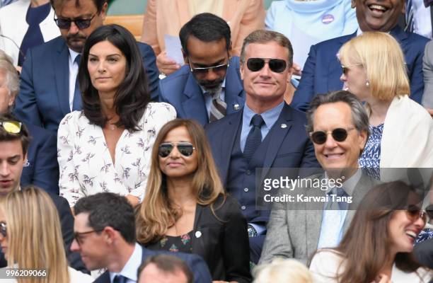 Karen Minier and David Coulthard attend day nine of the Wimbledon Tennis Championships at the All England Lawn Tennis and Croquet Club on July 11,...