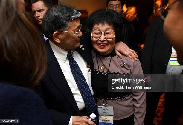 Secretary of Transportation, Norm Mineta, hugs an old collegue in California politics Helen Kawagoe, city clerk of Carson, Calif., after Mineta spoke...