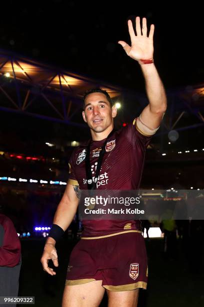 Billy Slater of Queensland waves to the crowd as he celebrates victory after game three of the State of Origin series between the Queensland Maroons...