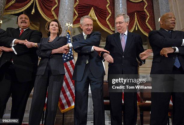 From left, Martin Luther King III, Speaker Nancy Pelosi, D-Calif., Senate Majority Leader Harry Reid, D-Nev., Senate Minority Leader Mitch McConnell,...