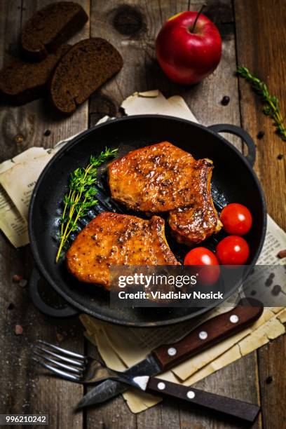 grilled pork chops in sweet honey glaze - glazen pot stock pictures, royalty-free photos & images