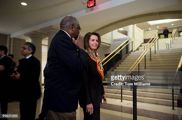 Speaker Nancy Pelosi, D-Calif., arrives with House Majority Whip James Clyburn, D-S.C., where they conducted a news conference which wrapped up the...