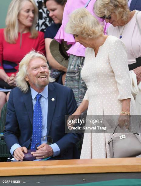 Richard Branson and Camilla, Duchess of Cornwall attend day nine of the Wimbledon Tennis Championships at the All England Lawn Tennis and Croquet...