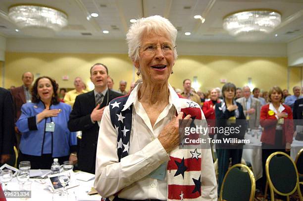 Gwen Poe of Bernalillo County, recites the Pledge of Allegiance during the state republican convention at the Marriott hotel in Albuquerque, N.M.