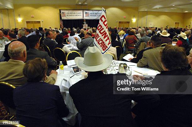 Attendees of the state republican convention at the Marriott hotel in Albuquerque, N.M., listen to a candidate's speech