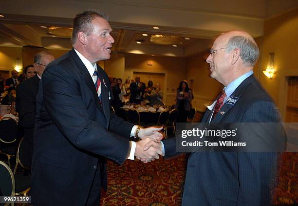 Former Rep. J.D. Hayworth, left, keynote speaker at the Lincoln Day Dinner, greets Rep. Steve Pearce, R-N.M., at the Marriott hotel in Albuquerque,...