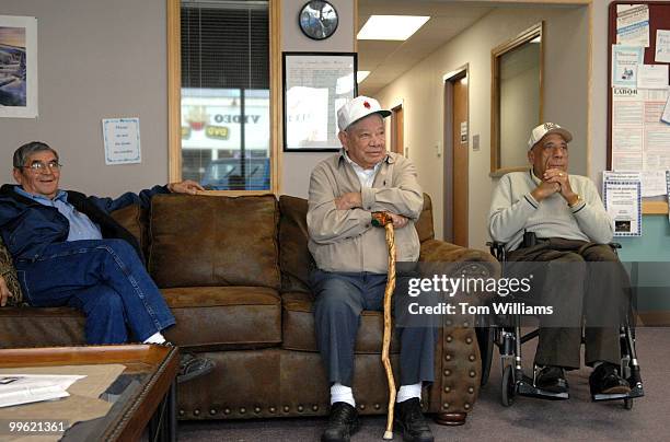 From left, Benito Via, Evy Gallegos, and Alfredo Flores, wait for the arrival of Rep. Steve Pearce, R-N.M., at Luna Community College for a meeting...