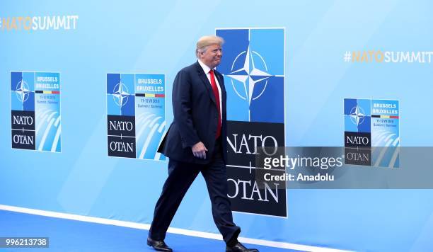 United States President Donald J. Trump is welcomed by Secretary General of North Atlantic Treaty Organization during the 2018 NATO Summit at NATO...