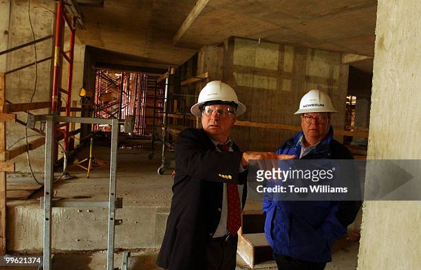 President of the Newseum, Peter Prichard, left, and vice president, Max Page, give a Roll Call reporter a tour of the construction of the museum's...